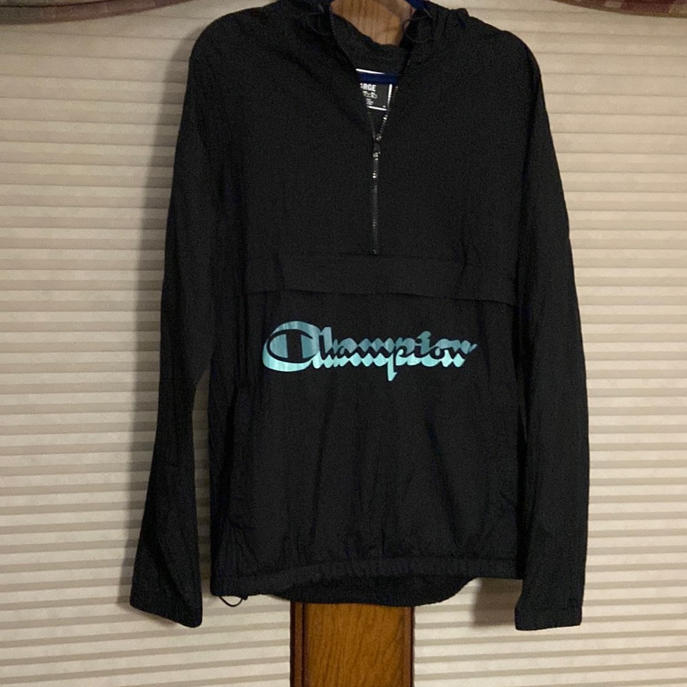 Black champion wind breaker. Size large. Mens